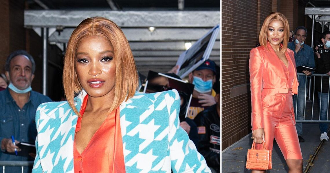 Keke Palmer Socializes With Her Fans Outside The Set Of The View Wearing A White-And-Blue Overcoat Over An Orange Pantsuit — Get The Look Keke Palmer Socializes With Her Fans Outside The Set Of The View Wearing A White-And-Blue Overcoat Over An Orange Pantsuit — Get The Look