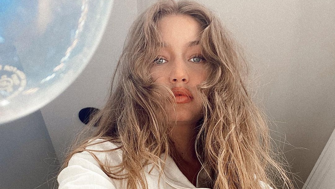 Gigi Hadid’s Reentry Into Public Eye Featured A Red Versace Jumpsuit