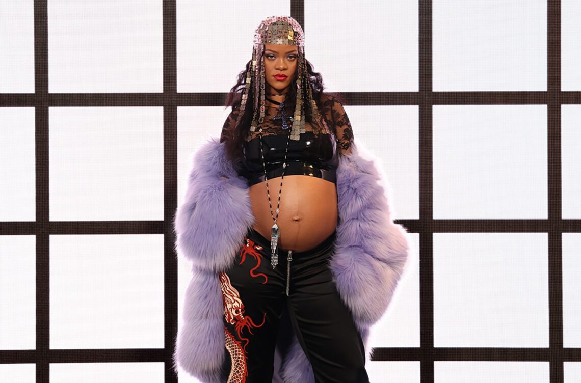 Photos Of Rihanna Holding A Dress At Target Spark Rumors About The Gender Of Her Baby