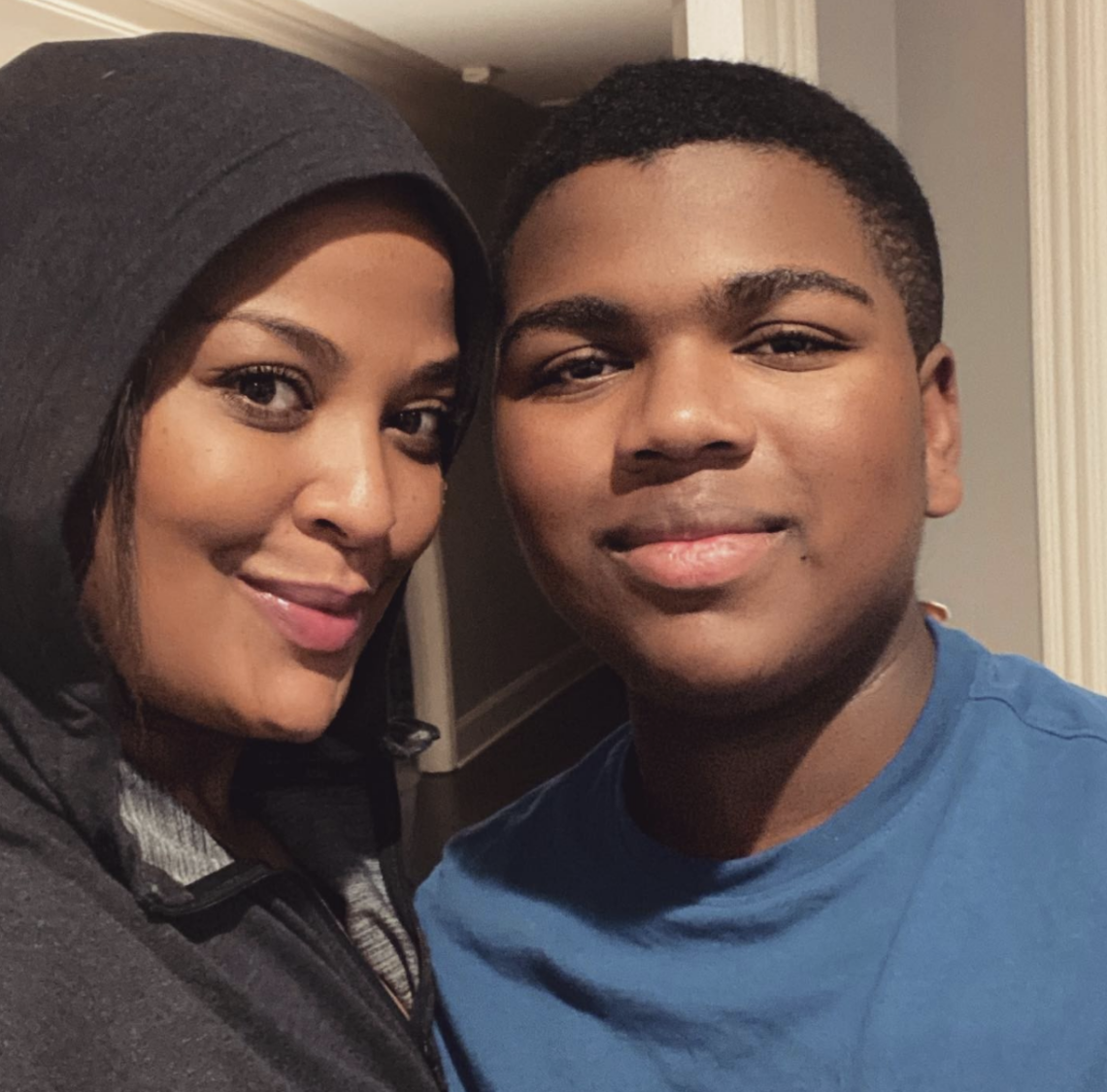 Laila Ali Shows Off The Shocking Resemblance Between Her Son & Her Father