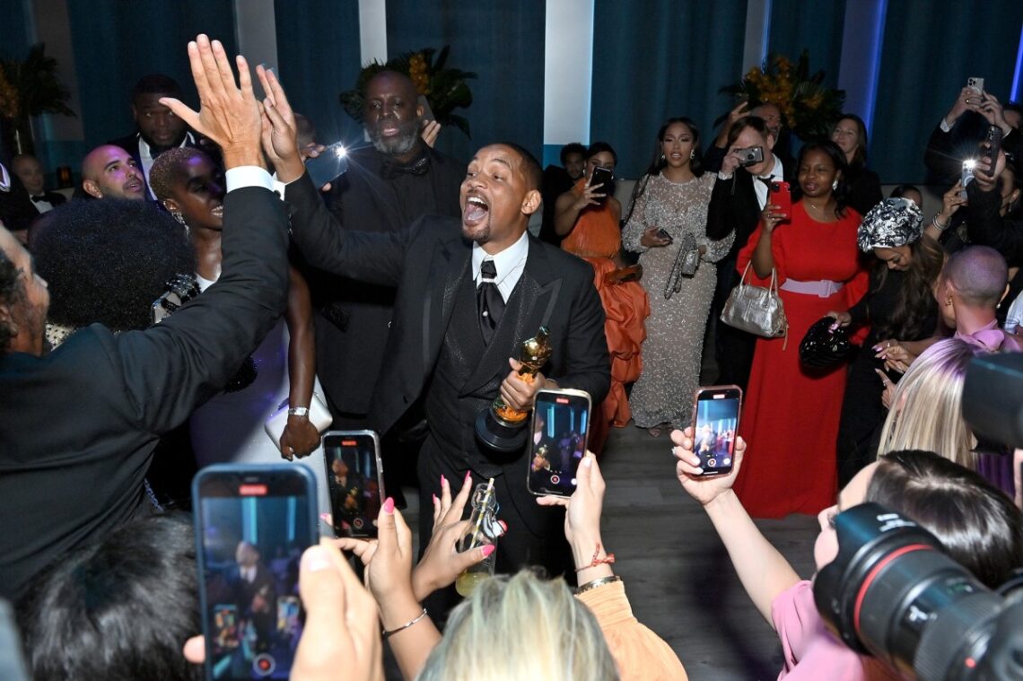 Will Smith parties at Vanity Fair’s Oscar bash after Chris Rock slap