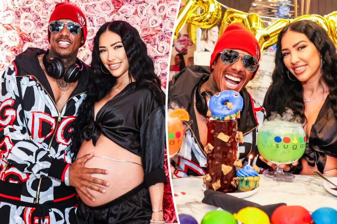 Nick Cannon cradles pregnant Bre Tiesi’s bump on babymoon