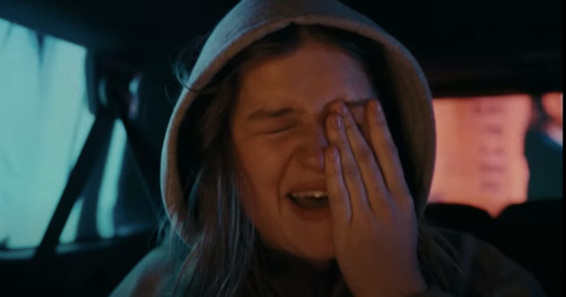 Hunter Schafer Directed girl in red’s Moody New Music Video