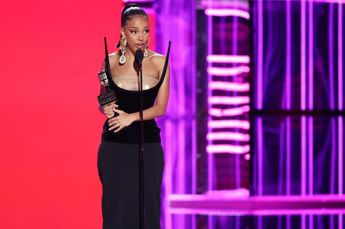 Doja Cat needed liquid courage and her vape pen to accept her Billboard Music Award