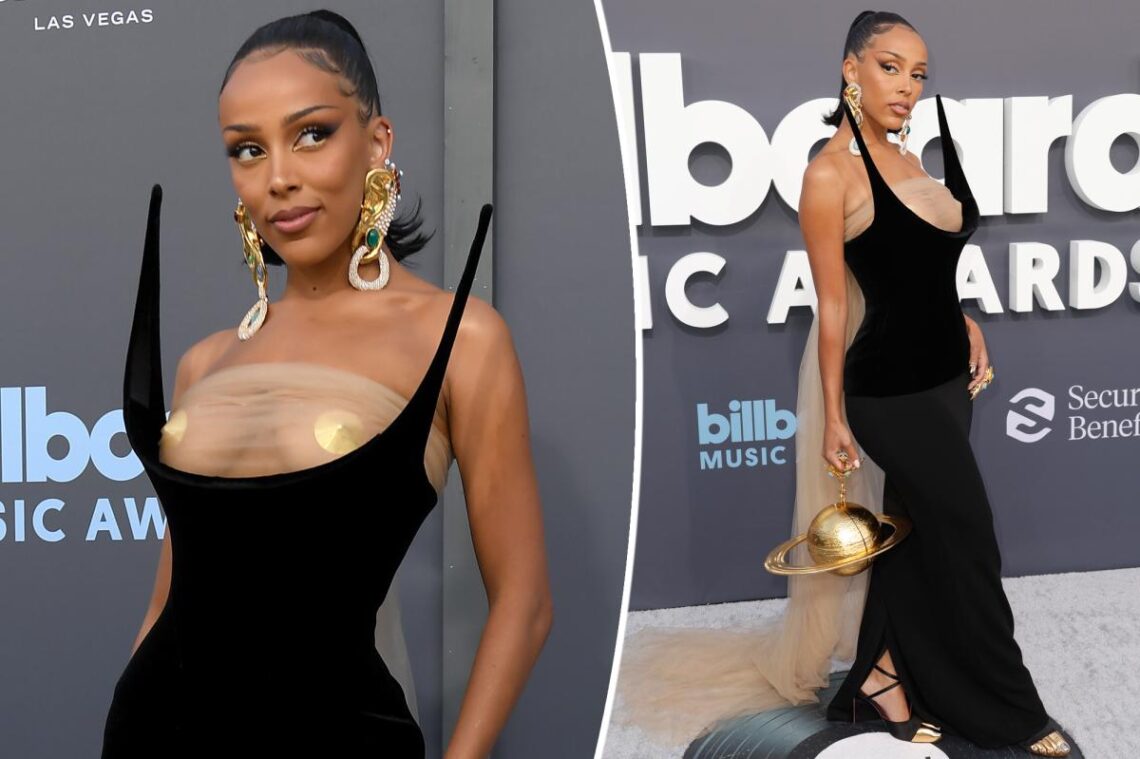 Doja Cat rocks topless gown on Billboard Music Awards 2022 red carpet