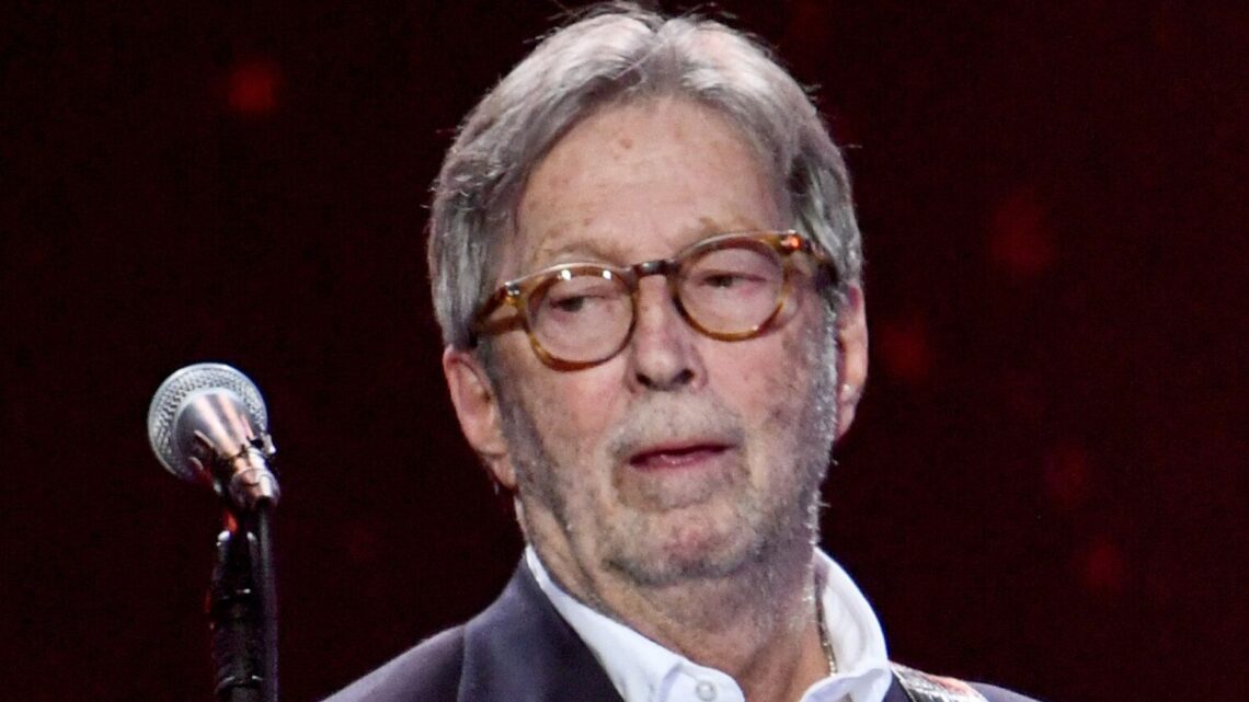 Vaccine Skeptic Eric Clapton Contracts COVID, Cancels Shows Because He’s ‘Anxious’