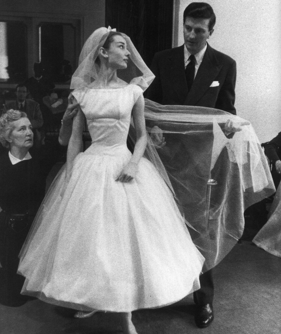 Iconic On-Screen Wedding Dresses — Best Bridal Looks on Screen JLo Vegas Carrie Bradshaw