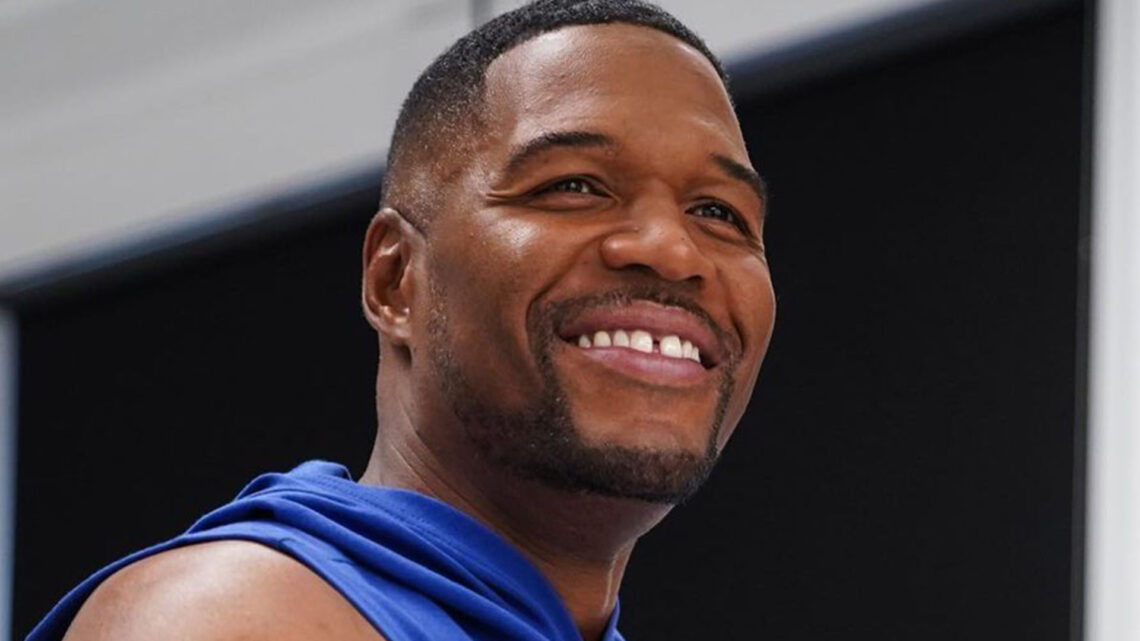 GMA’s Michael Strahan is ‘all smiles’ as he flexes his muscles in sleeveless top for new photo GMA’s Michael Strahan is ‘all smiles’ as he flexes his muscles in sleeveless top for new photo
