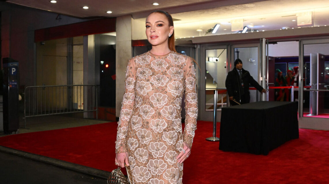 Lindsay Lohan Stuns in an Embroidered Valentino Gown at the ‘Falling For Christmas’ Premiere