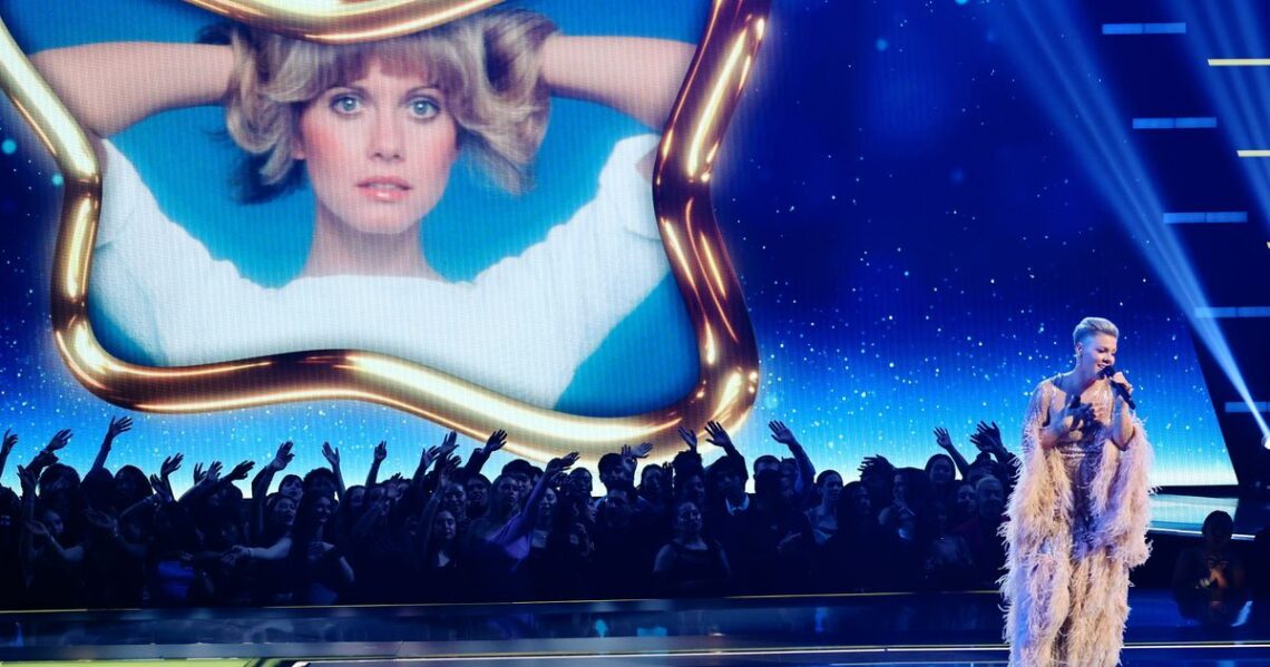 Pink Honors Late Olivia Newton-John With ‘Hopelessly Devoted To You’ At 2022 AMAs