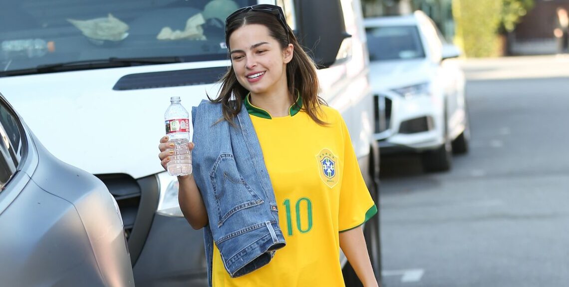 Addison Rae Doubles Down on the No-Pants Trend in an Oversized Vintage Tee