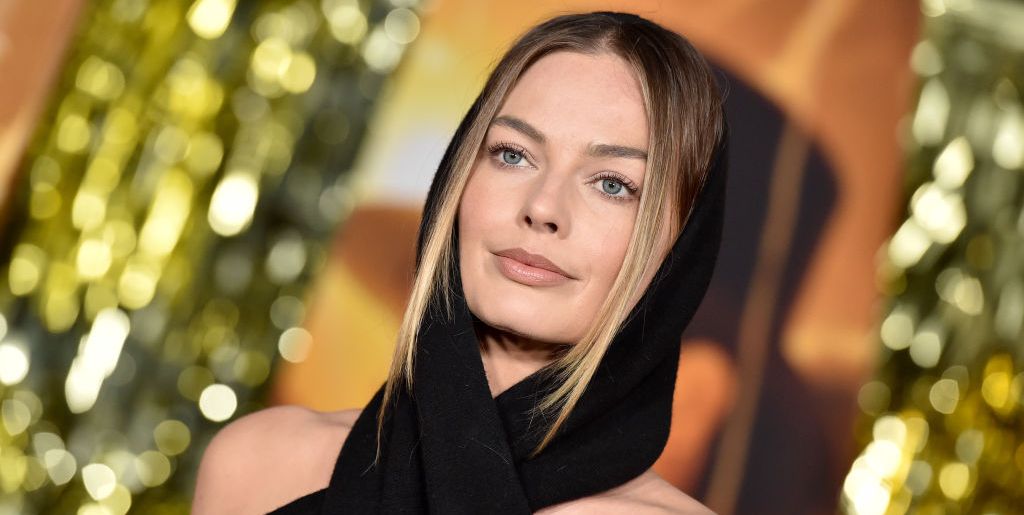 Margot Robbie Wins the Babylon Red Carpet in a Knitted Hooded Minidress