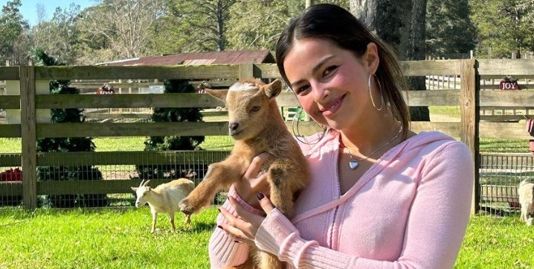 Addison Rae Enters Her Y2K Fashion Era in a Cropped Pink Hoodie and Low-Rise Jeans