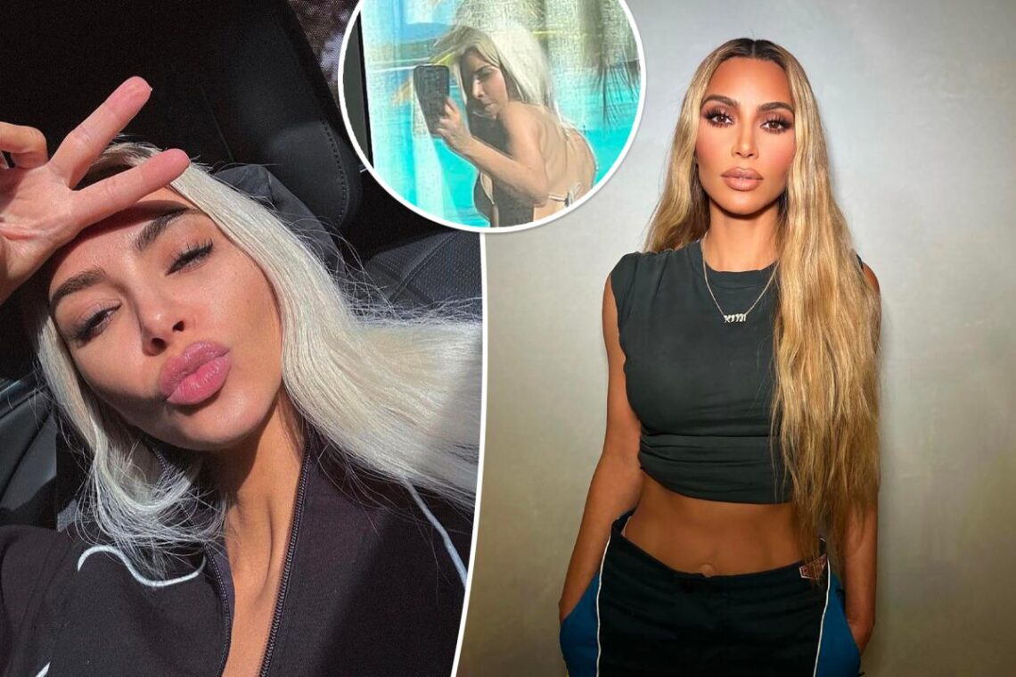 Kim Kardashian ‘looks back’ at her butt in silver Skims bikini