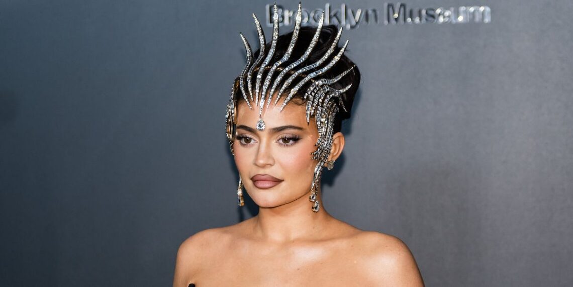 Kylie Jenner Styled Her See-Through Slipdress with Big Sister Kendall’s Favorite Accessory