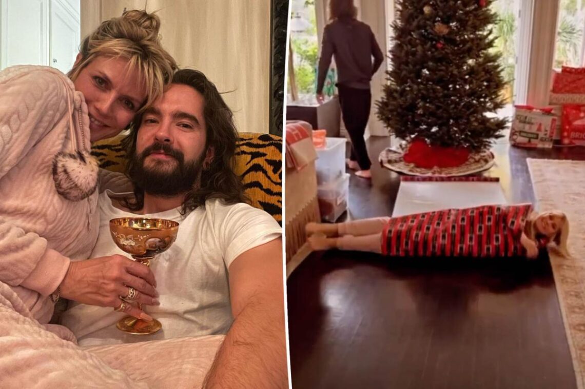 Heidi Klum wraps herself up as a Christmas present for husband Tom Kaulitz