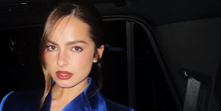 Addison Rae Wears The Famous “Sex and the City” Blue Trench Coat With a Satin Bra Underneath